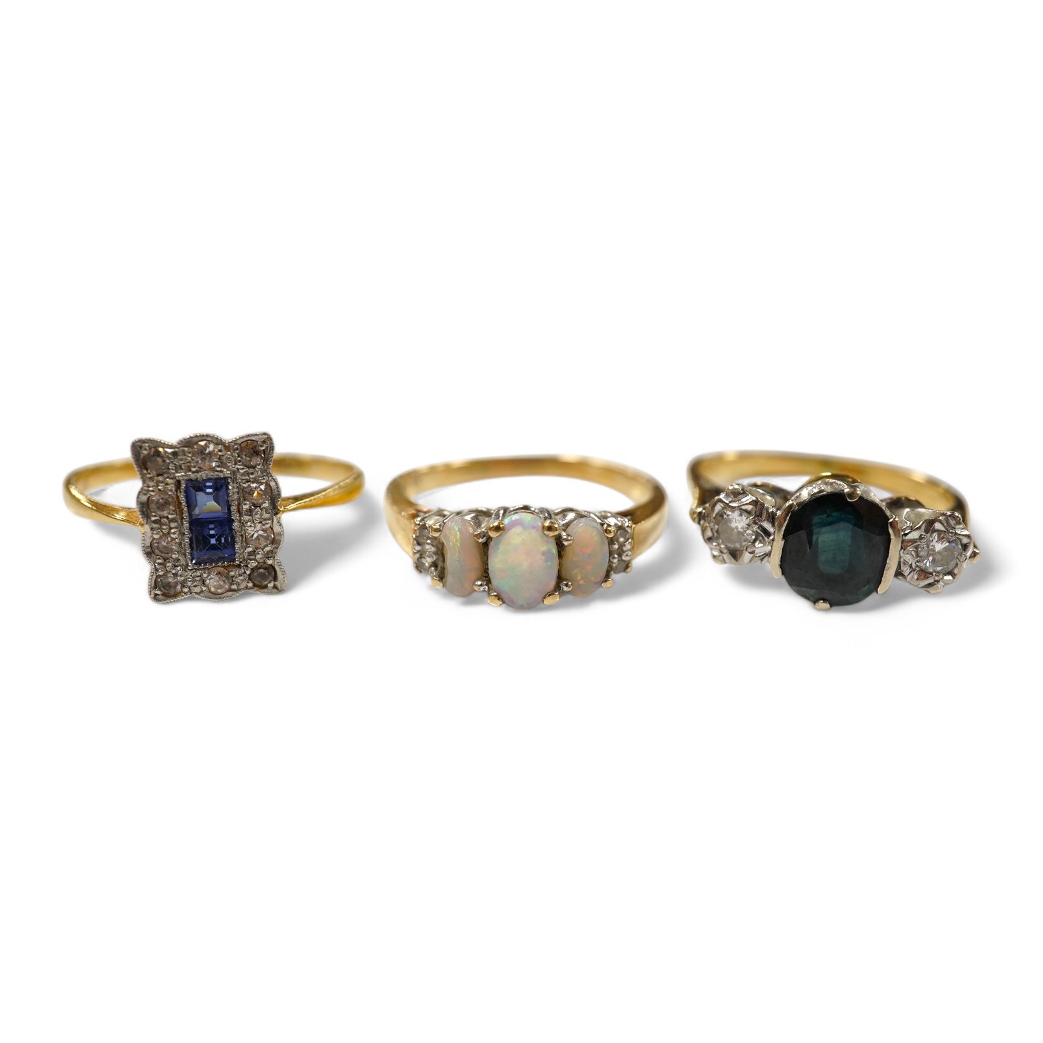 A 10k and three stone opal ring, with diamond set shoulders, an 18ct, sapphire and diamond three stone ring and a 1920's 18ct and plat. sapphire and diamond tablet ring, size P/Q, gross weight 8.1 grams Condition - poor